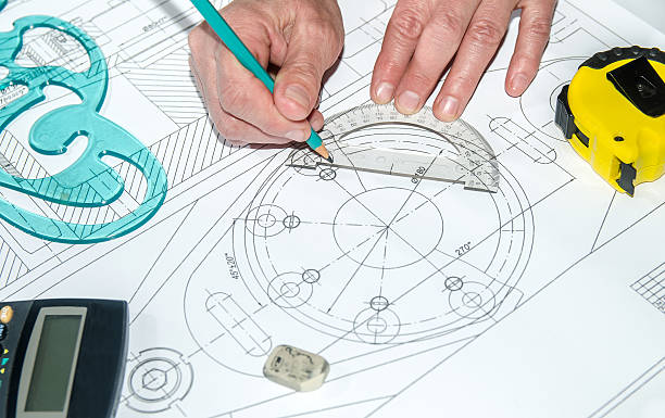 istock engineering drawings with hands drawing  project by pencil on paper 472641136