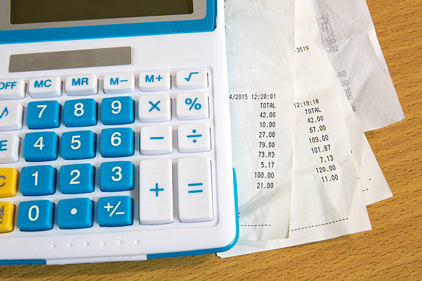 istock Close up of receipt paper and caculator, payment 472641888