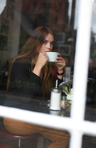 istock Cafe Girl 472642118