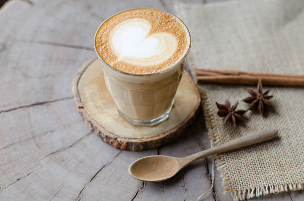 istock hot coffee on wooden table 472642652