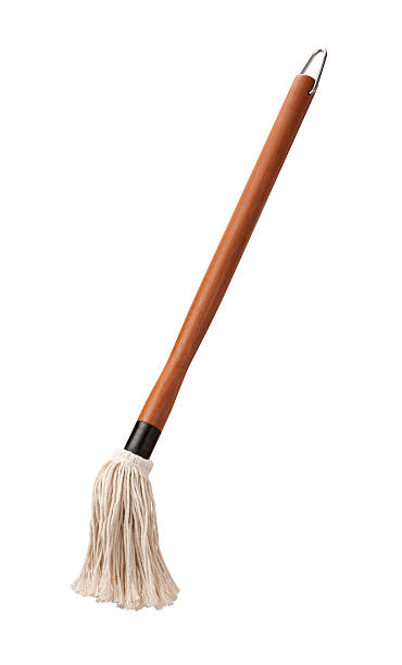 istock Barbecue Sauce Basting Mop with a Wooden Handle isolated 472646946