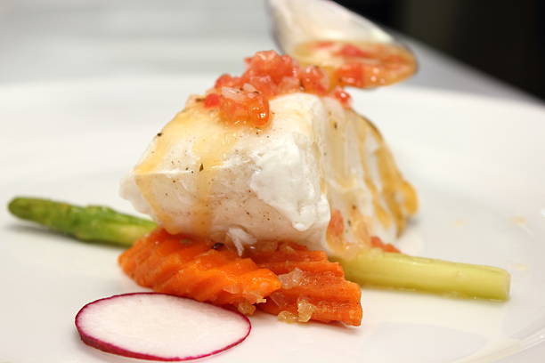 istock Grilled Snow Fish with white sauce. 472647668