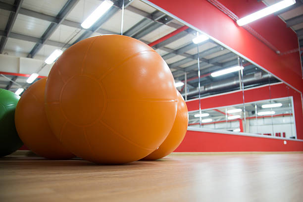istock Bunch of fitballs in gym 472651162