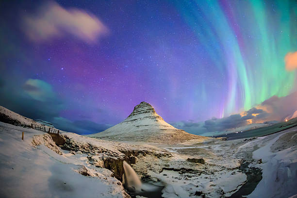 istock Spectacular northern lights appear over Mount Kirkjufell 472651222