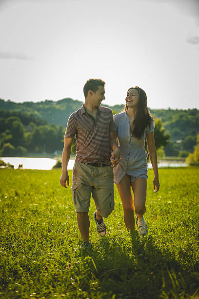 istock Happy young couple on a picnic 472653618