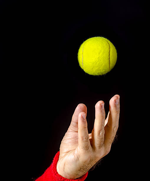 istock Tossing the tennis ball 472656772