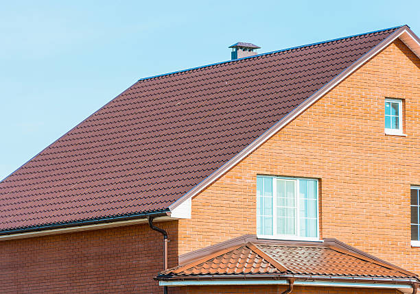 istock house with a gable roof window 472656806
