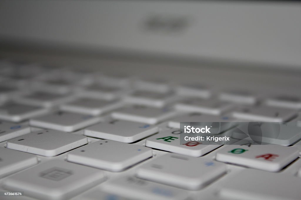 White keyboard A white keyboard, from a laptop 2015 Stock Photo