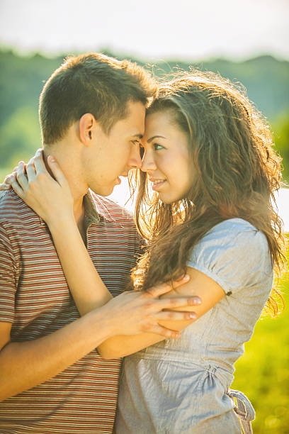 istock Happy young couple on a picnic 472664386