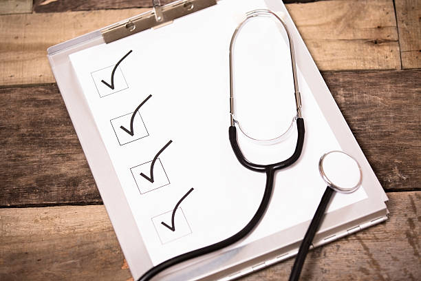 istock Clipboard, medical chart with checklist, check marks and stethoscope. Desk. 472664780