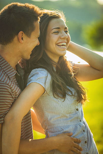 istock Happy young couple on a picnic 472664964