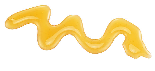 istock A wiggly honey stain on a white background 472666388