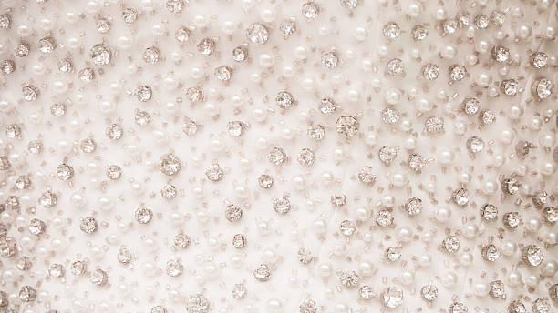 rhinestone and pearl background close up bodice white dress with embroidery of rhinestones and pearls costume jewelry stock pictures, royalty-free photos & images
