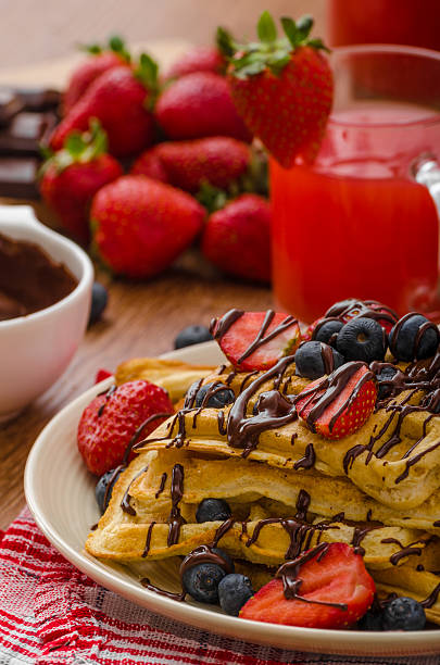 istock Belgian waffles with blueberries, strawberries 472667254