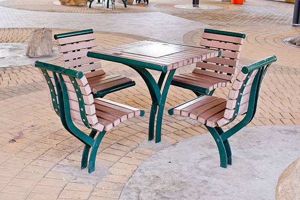 istock Brown and Green table and chairs in park.- rest area. 472668662