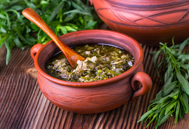 istock meat and greens soup 472671742