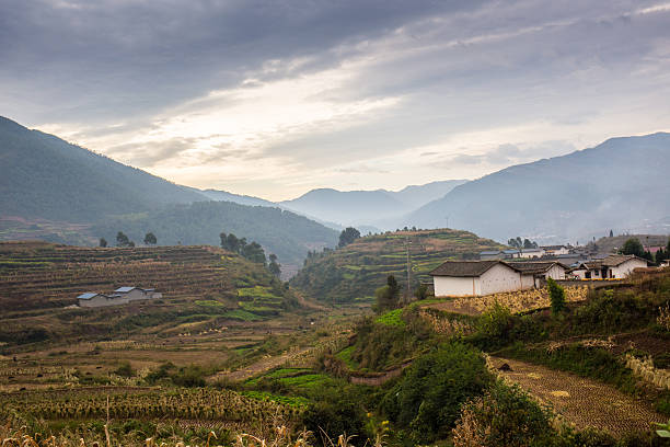 istock Rural landscape with fields and houses 472673652