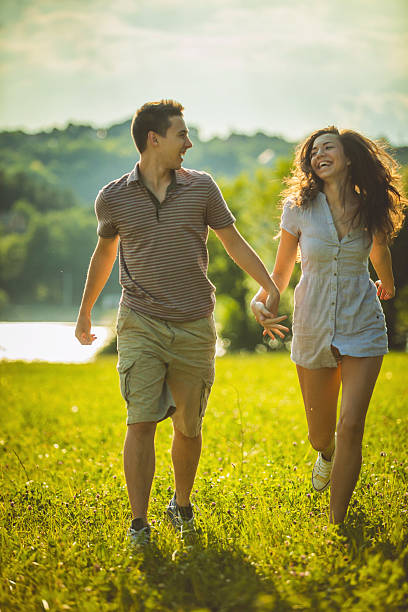 istock Happy young couple on a picnic 472676950