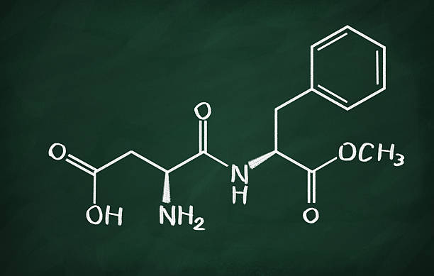 Aspartame Chemical formula of Aspartame on a blackboard chemical formula for aspartame stock pictures, royalty-free photos & images