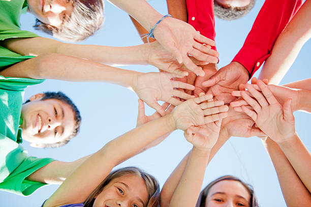 istock Group of Children Working Together 472677382
