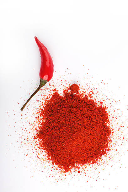 istock Hot peppers and chili powder 472678276