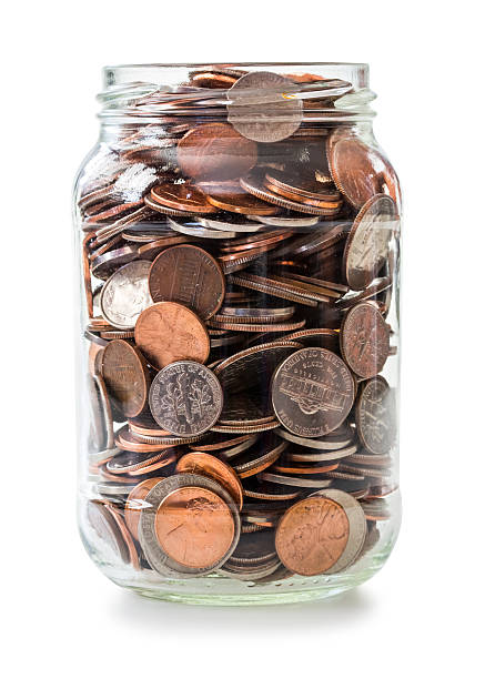 istock Jar full of coins 472679402