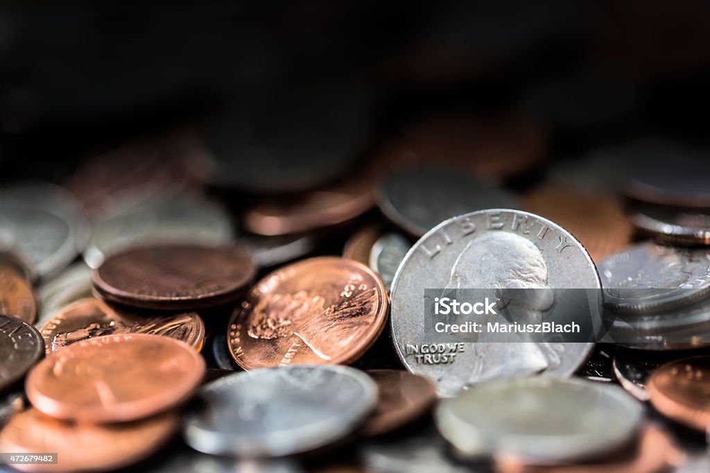 American coins background Photograph of American coins with black copy space above coins. 2015 Stock Photo