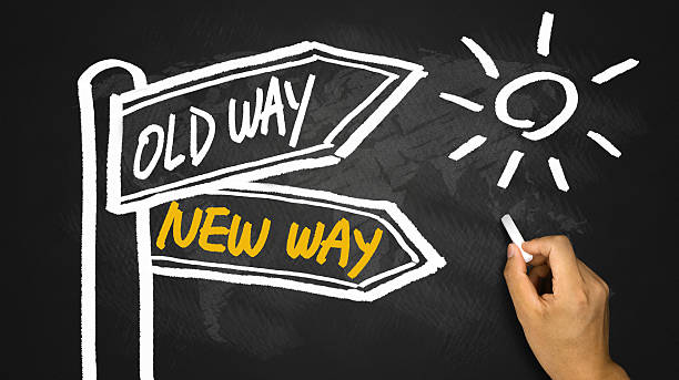 istock new way or old way signpost hand drawing on blackboard 472679598