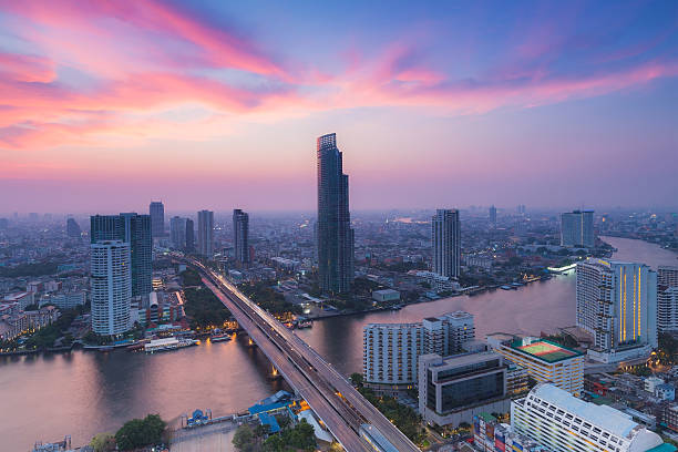 istock Modern Business Building along the river curve 472680608