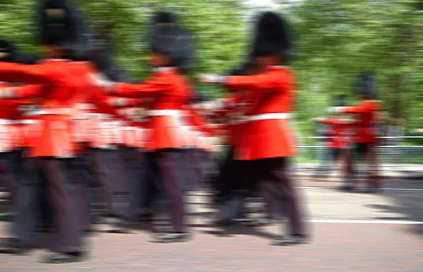 A summer's day in London and, watched by numerous sightseers, members of the Grenadier Guards take part in the tourist highlight that is the Changing of the Guard (which is officially known as Guard Mounting). Now with added motion blur.
