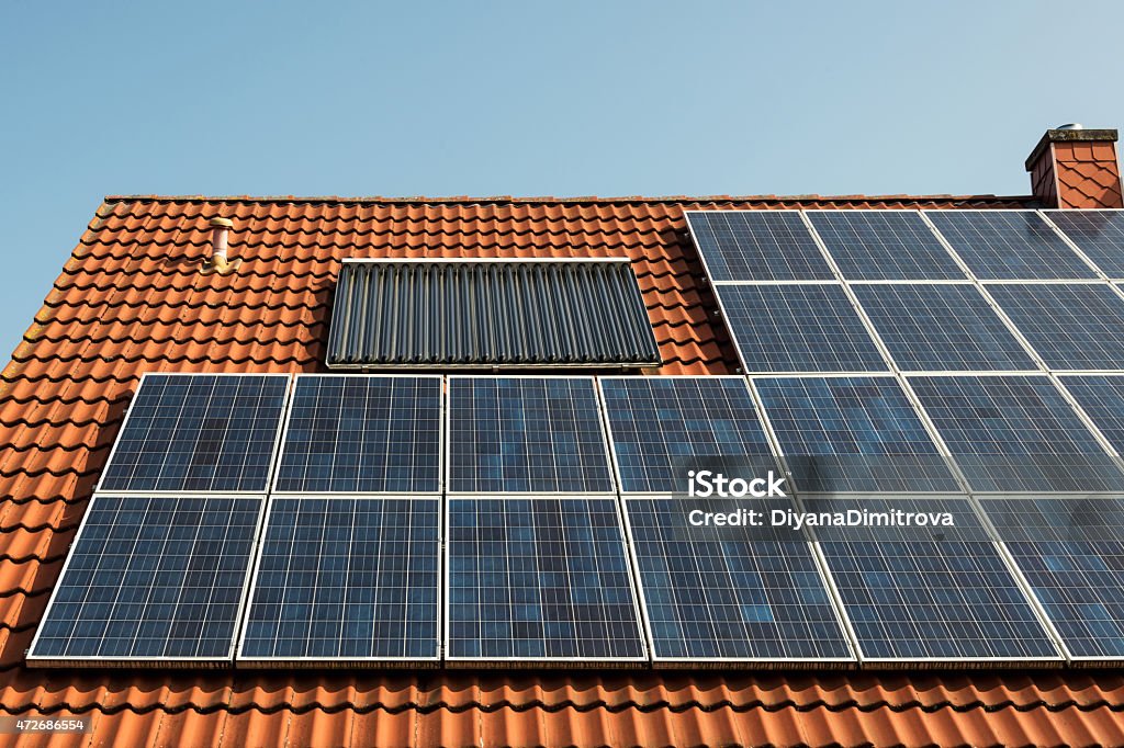 Solar panel on a red roof 2015 Stock Photo