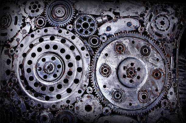 istock Old and dirty metal wheel gear weld background 472686766