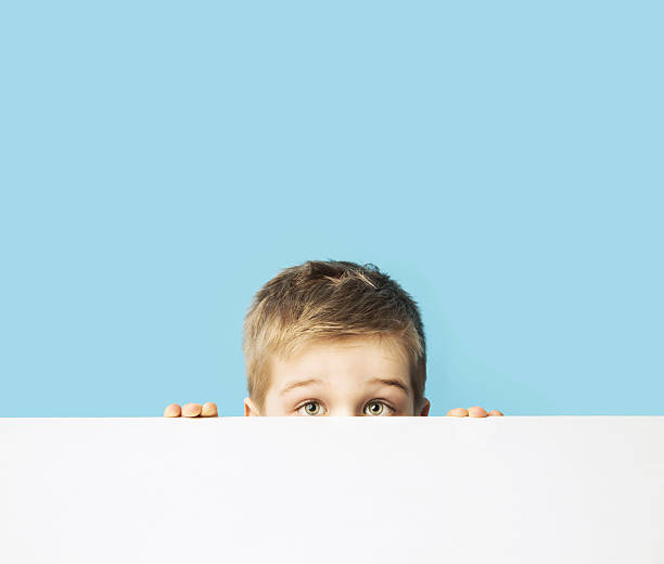 istock Portrait of the small shy boy 472687010