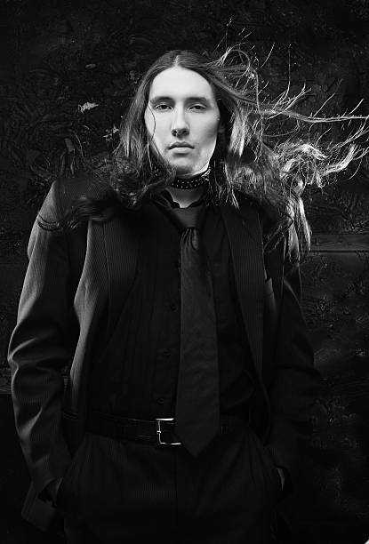 istock Handsome man with long hair 472688726