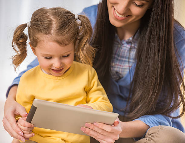 istock Mom with little daughter 472688912