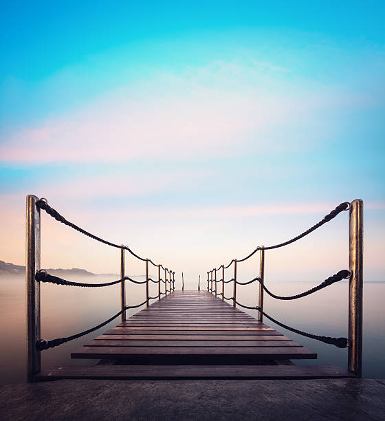 istock Wooden Jetty At Sunrise 472689262