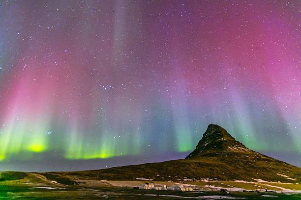 Northern Light Aurora Iceland The Northern Light Aurora borealis at Kirkjufell Iceland kirkjufell stock pictures, royalty-free photos & images