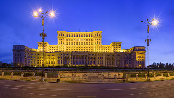 Romanian Parliament by night stock photo