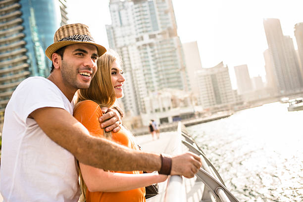 istock togetherness couple in vacations on Dubai Marina - UAE 472691602