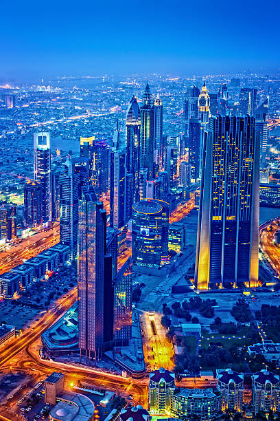 Modern Dubai cityscape, E11 Sheikh Zayed Road highway, Dubai, United Arab Emirates at twilight. View from Burj Khalifa skyscraper.