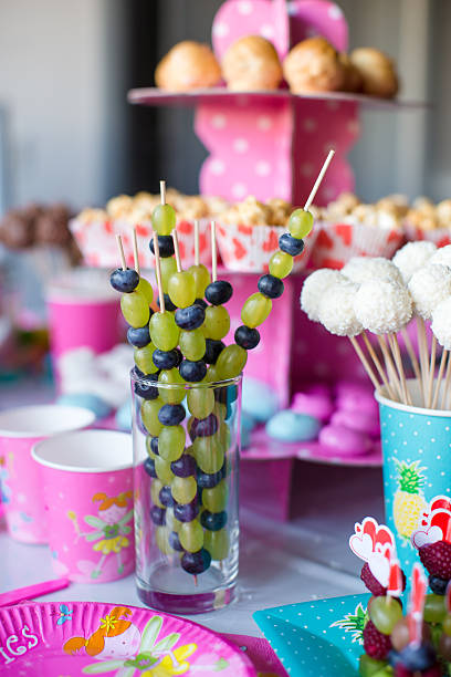 istock Marshmallow, sweet colored meringues, popcorn, custard cakes 472692638