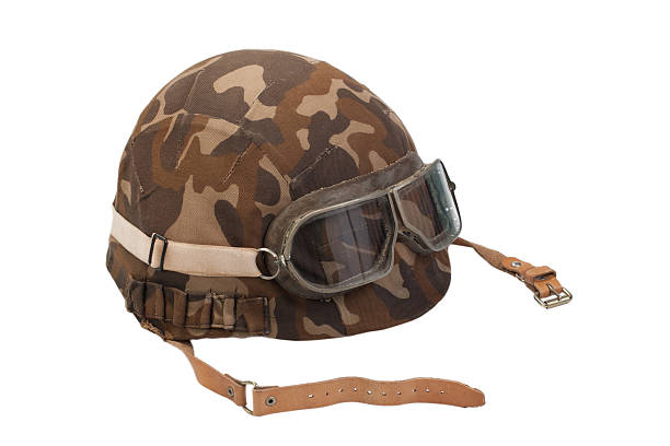 istock soviet camouflaged helmet with goggles isolated on white 472693610
