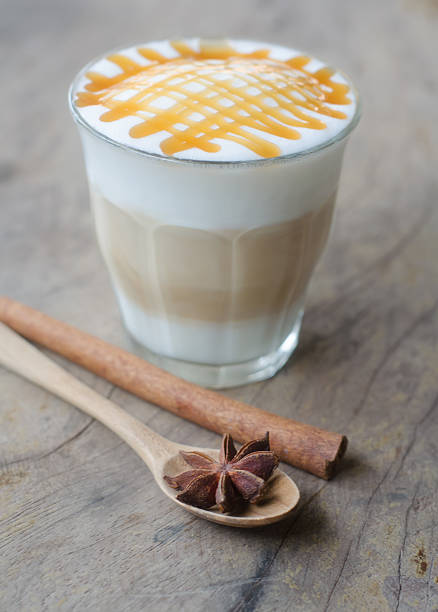 istock hot coffee on wooden table 472693632