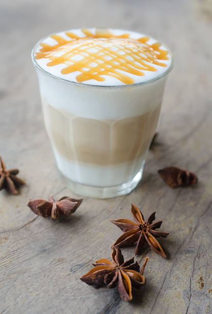 istock hot coffee on wooden table 472693638