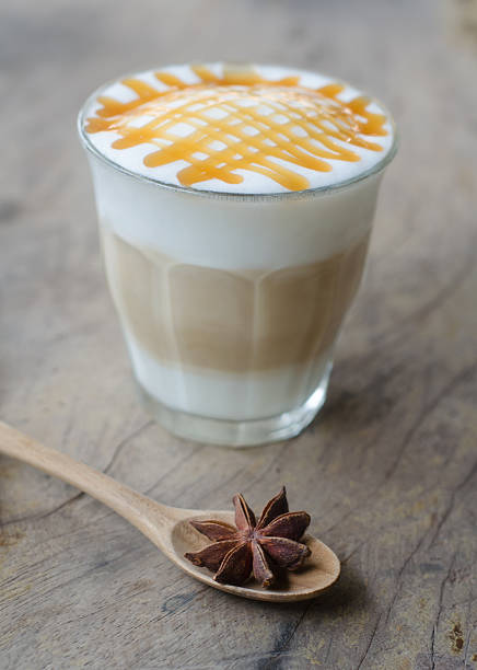 istock hot coffee on wooden table 472693640