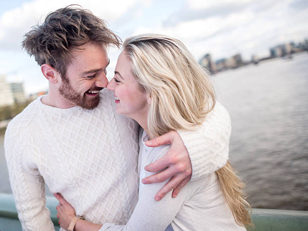 istock Romantic couple kissing 472695636
