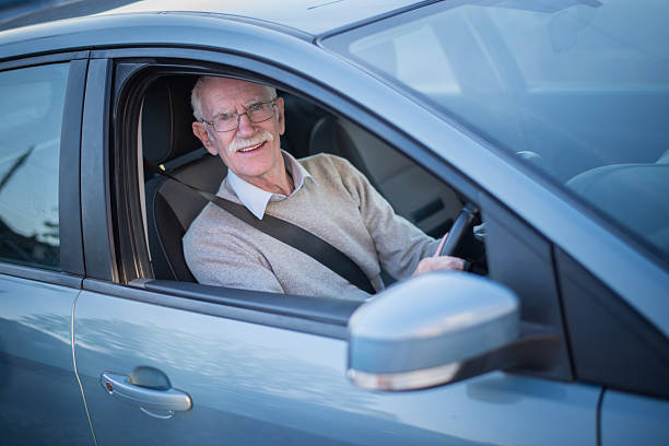 istock English man driving a car 472695694
