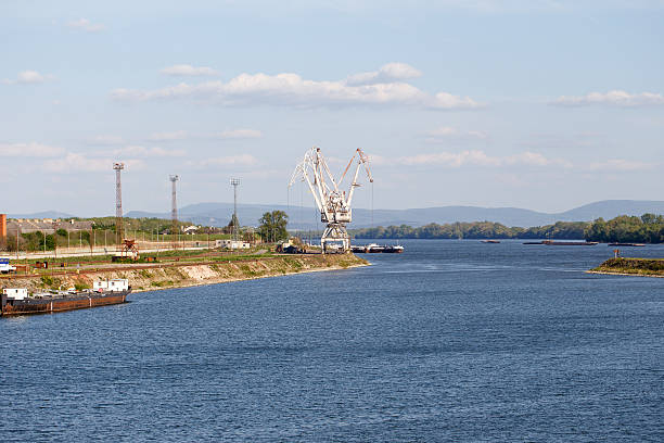 istock Old dock with portal cranes on Danube 472696716