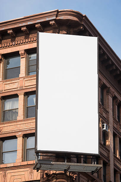 Soho A blank billboard in Soho New York. soho billboard stock pictures, royalty-free photos & images