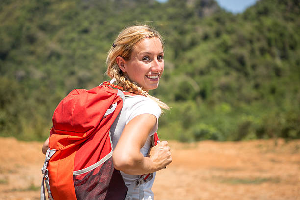 istock Girl enjoying hiking in summer 472699480